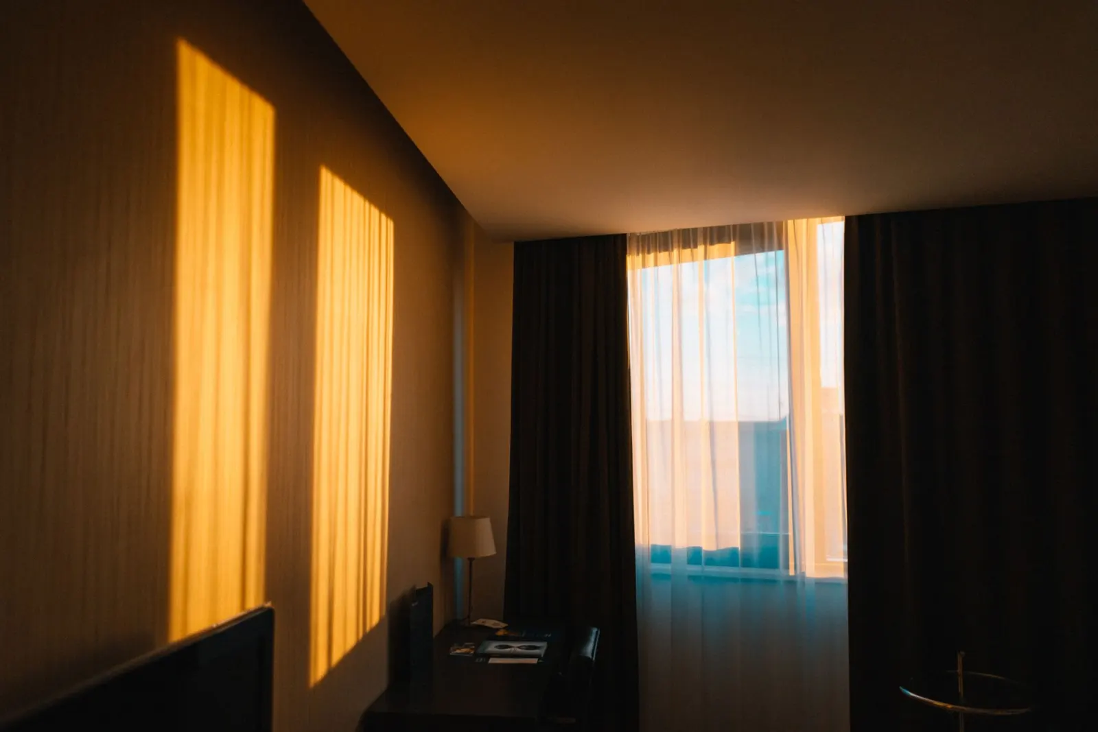 Curtains and sheers beside a window